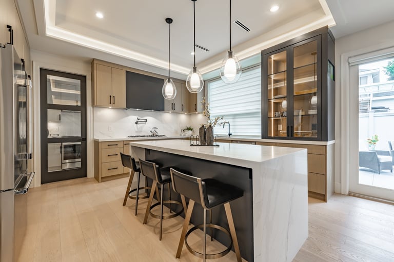 Clean modern kitchen with white countertops and wooden cabinets, move-in ready